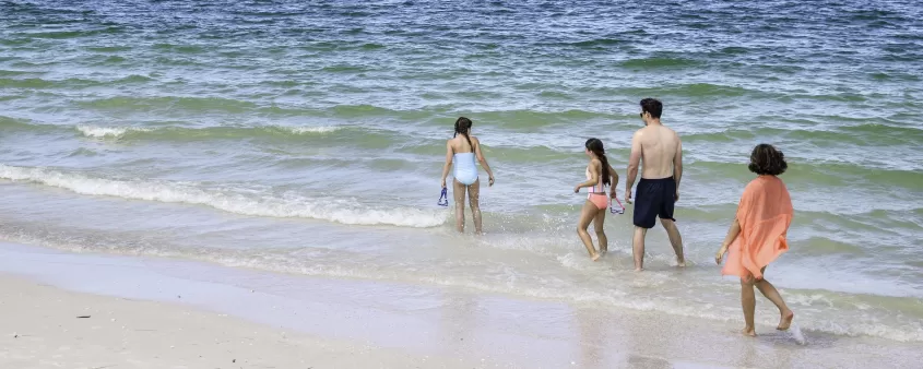 Family on the beach at Lovers Key State Park